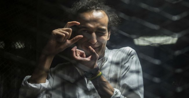 Un fotojurnalist celebru, închis în Egipt, este premiat de UNESCO