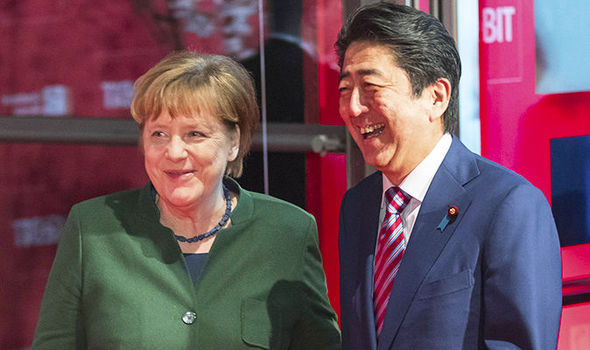 Merkel şi Abe sprijină liberul schimb, aflat în ‘turbulenţe’