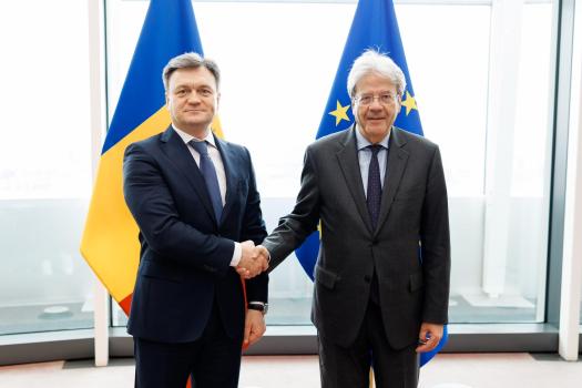 Premierul Recean a discutat la Bruxelles cu Paolo Gentiloni – Comisarul european pentru economie