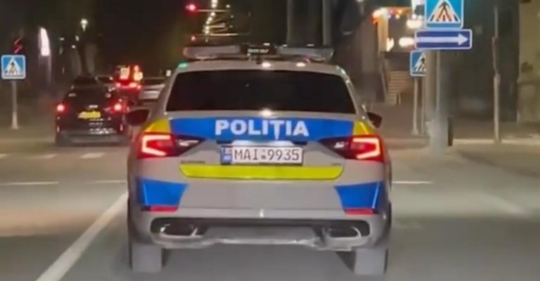 Poliţist luat la bătaie în plină stradă