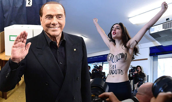 Alegeri Italia – Protest topless la o secție de votare : „Berlusconi, ai expirat”